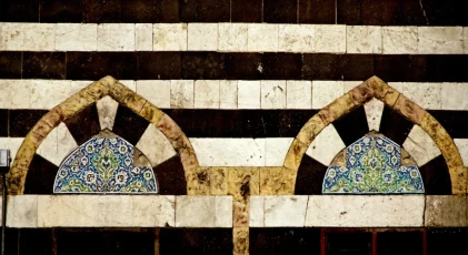 Damascene painted tiles over the windows, as-Sinaniyya Mosque