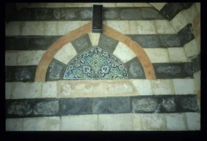 Colorful ornamental motifs on ablaq wall, Jamiʿ as-Sinaniyya