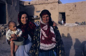 Women wearing screen-printed headscarfs (Habari)