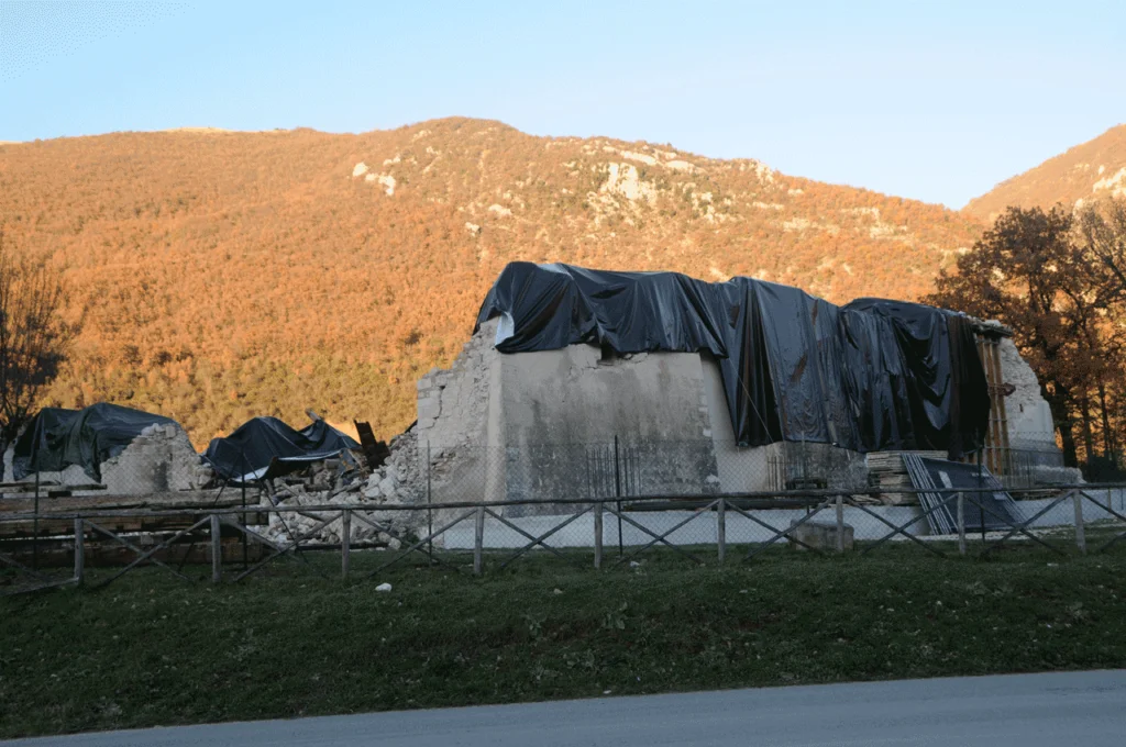 Covering rubble infill, protective tarpaulin of outer walls, San Salvatore a Campi, Perugia, Italy