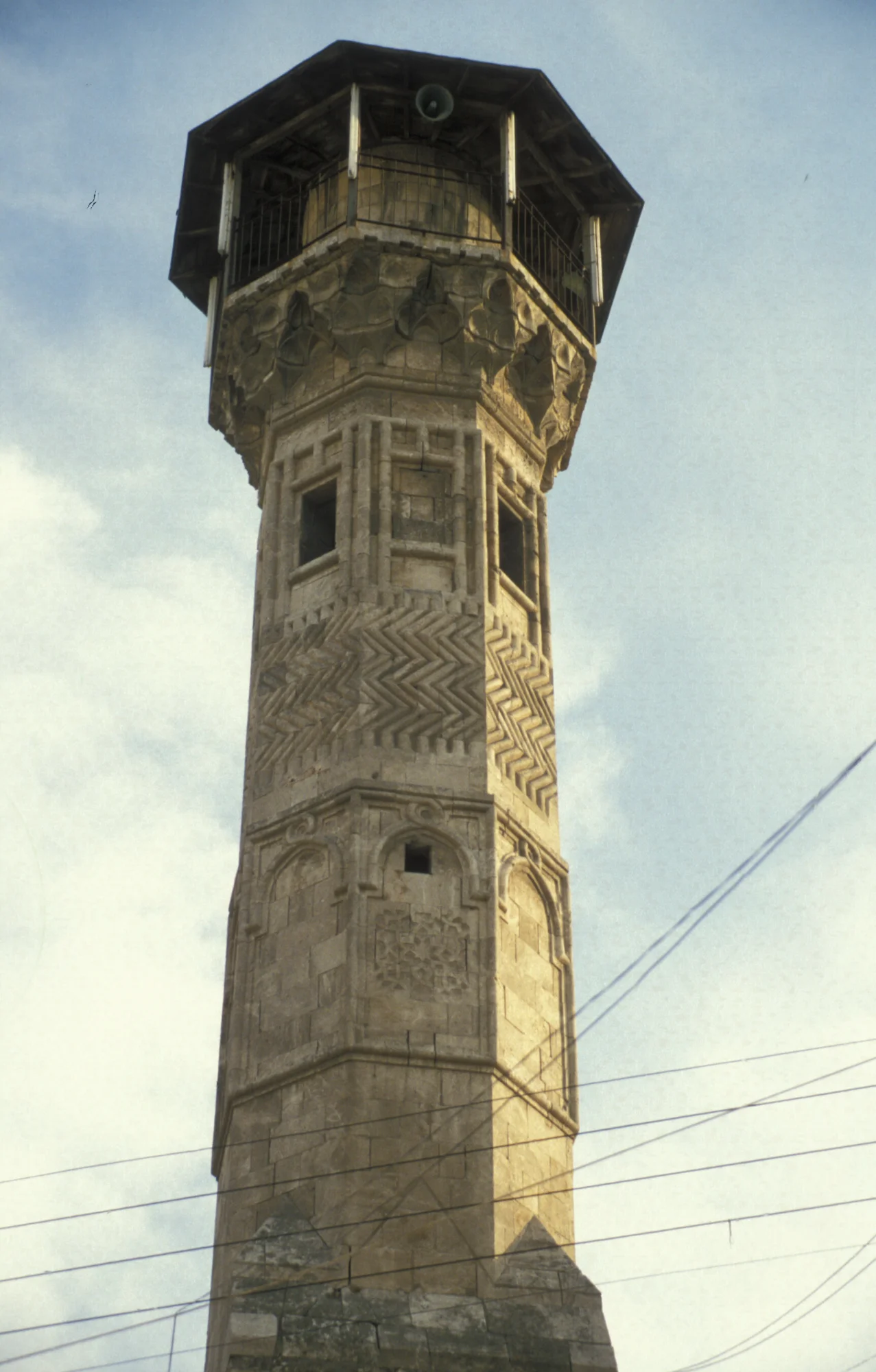 The octagonal minaret of the Mamluk Jamiʿ as-Saffahiyya with rich architectural decoration